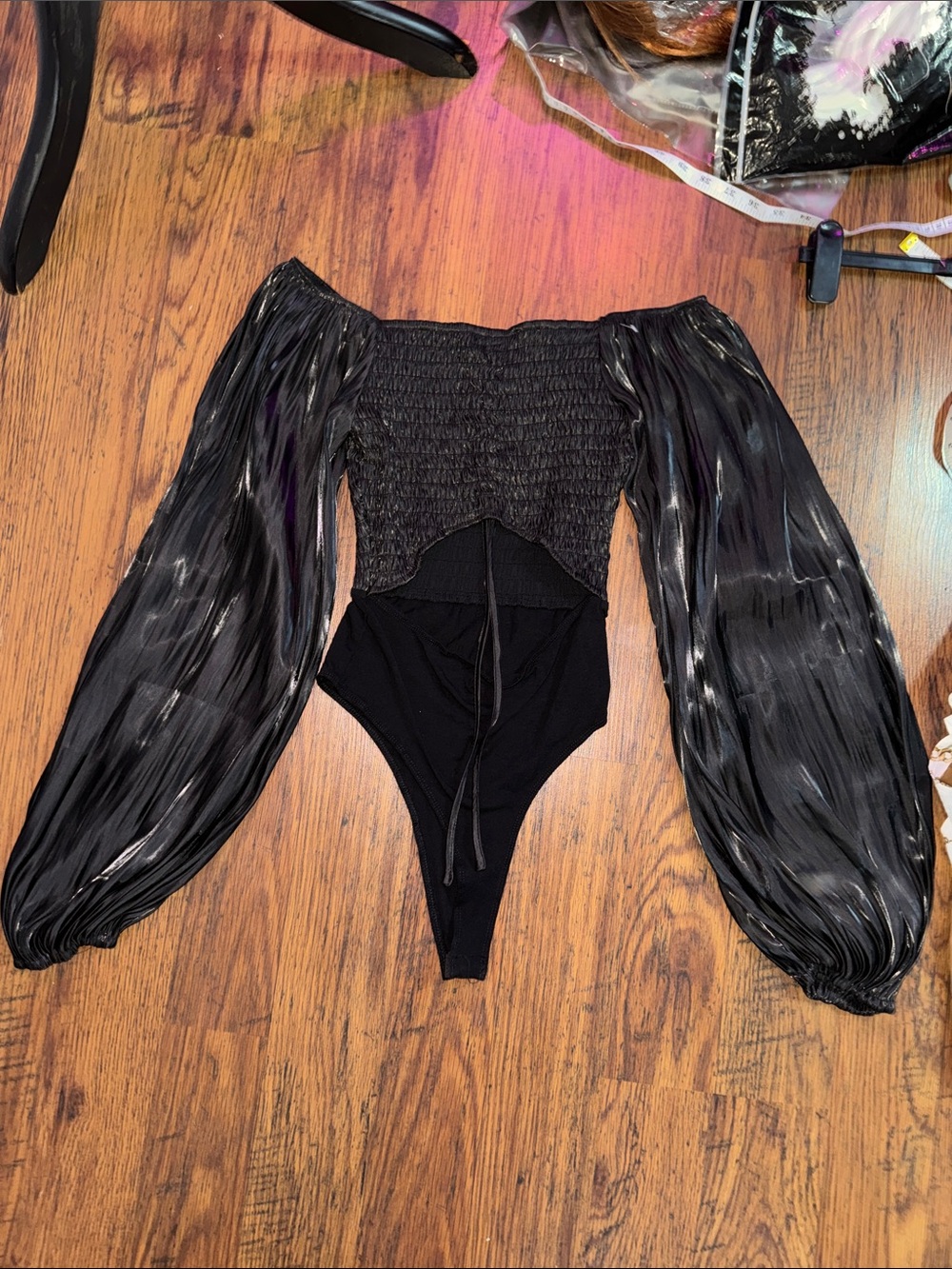 Lulu's Black Off-Shoulder Smocked Front Tie Up Balloon Sleeve Bodysuit